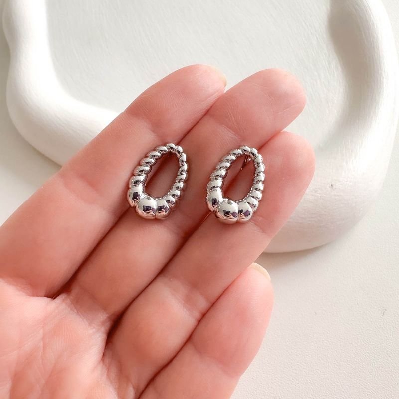 Brinco Banhado Oval Gomos