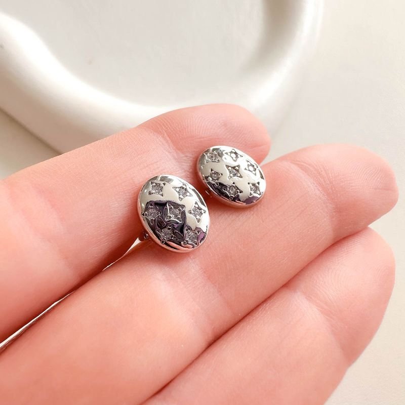 Brinco Banhado Oval Mini Estrelas com Zircônia