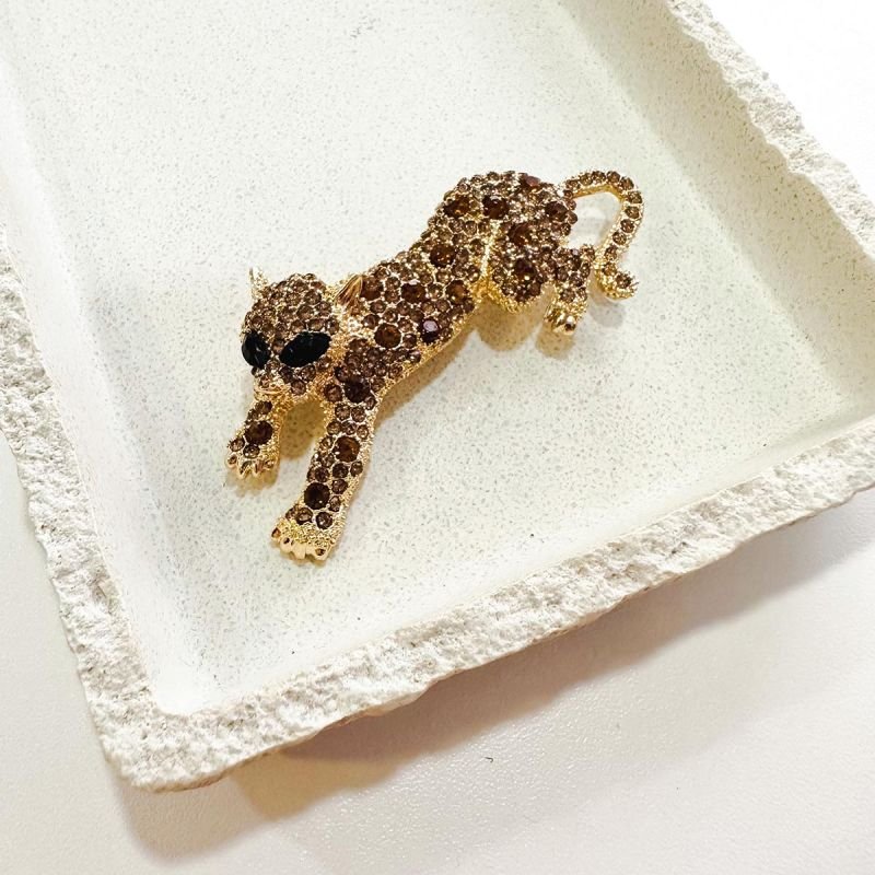 Broche Bijuteria Onça Cristais Champagne