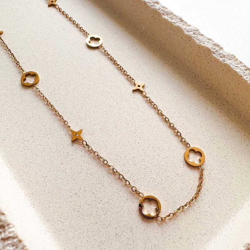 Colar Aço Dourado Trevo Vazado