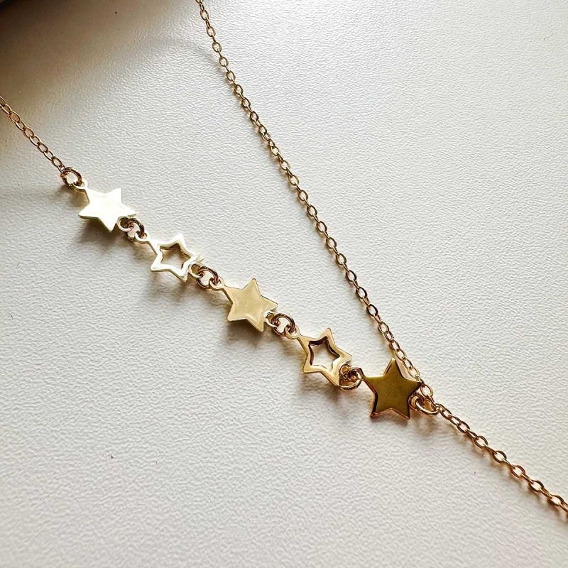 Colar Gravatinha Estrelas Vazadas Banhado a Ouro 18K