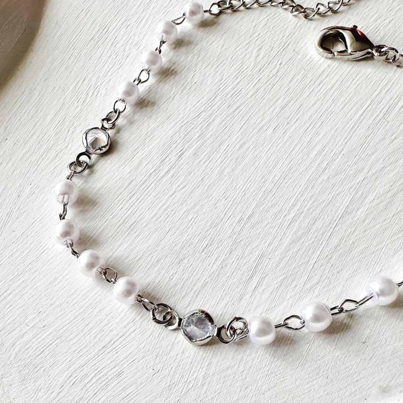 Pulseira Banhada Pérola e Ponto de Luz