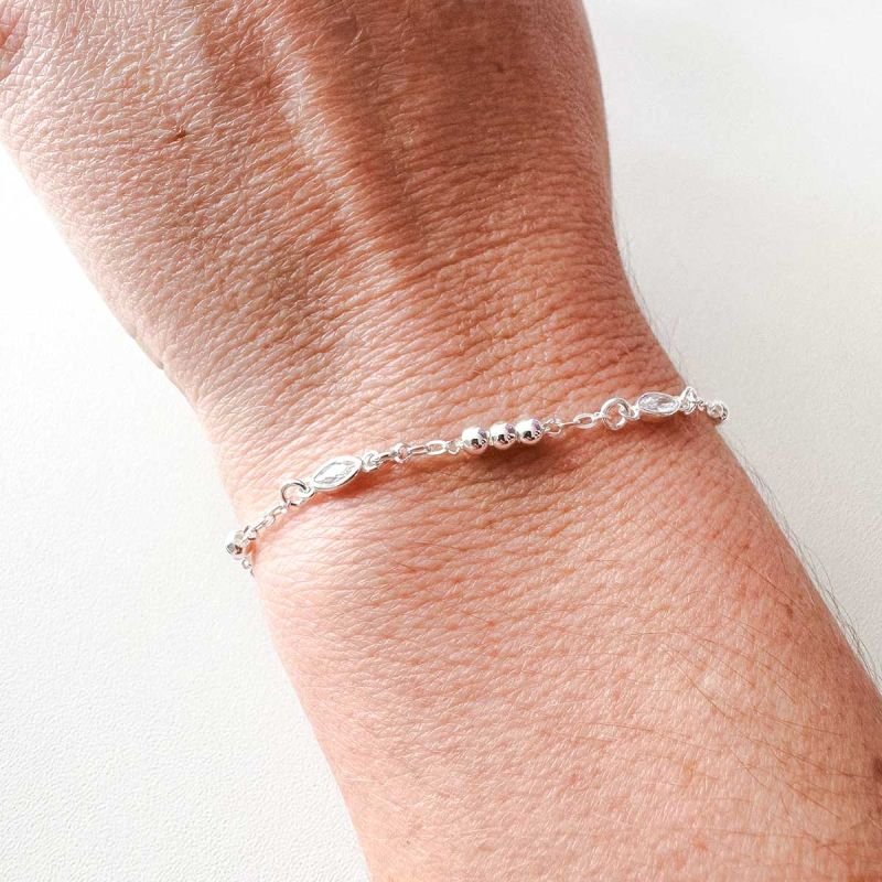 Pulseira de Prata Bolinha e Ponto de Luz