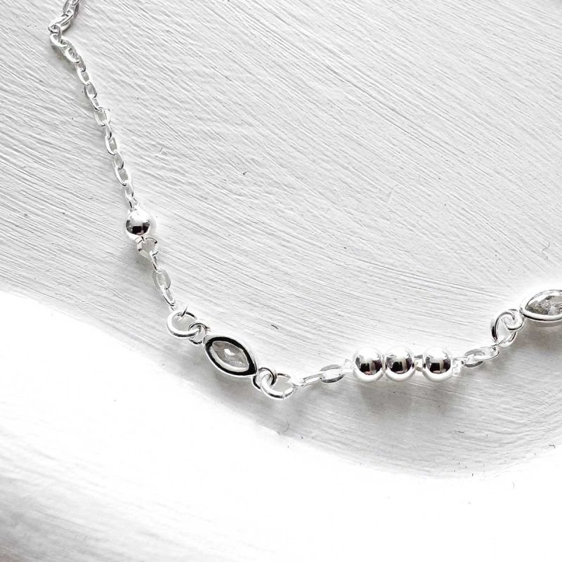 Pulseira de Prata Bolinha e Ponto de Luz
